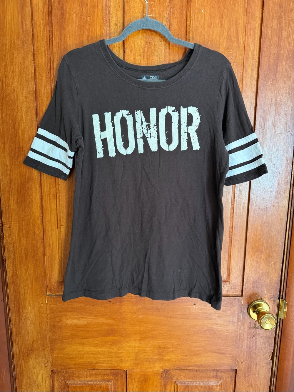 NFL Black Tee with White 'HONOR' Graphic and Stripe Sleeves